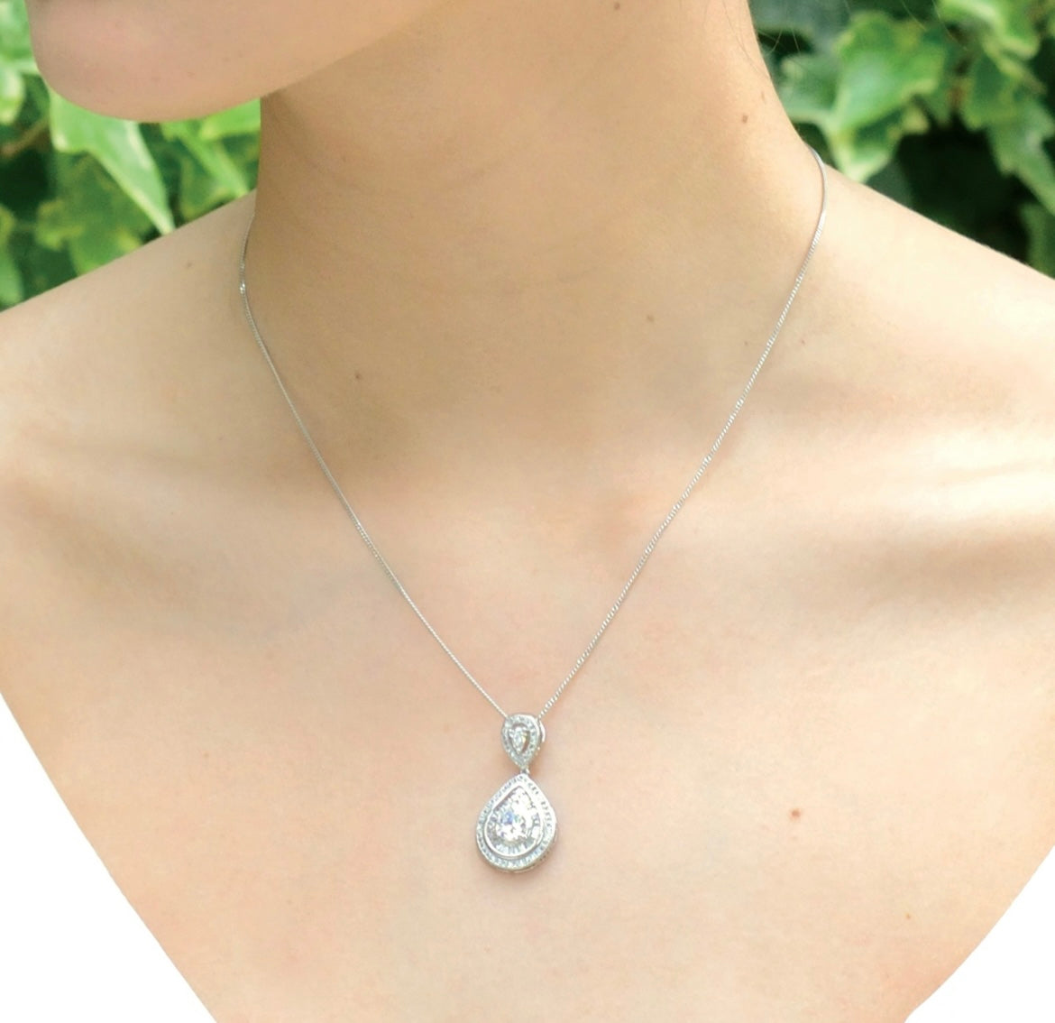 Montgomery rhodium crystal baguette teardrop pendant set