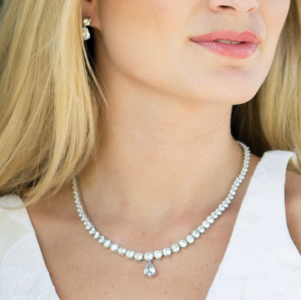 Imperial rhodium crystal teardrop necklace, earrings and tennis bracelet